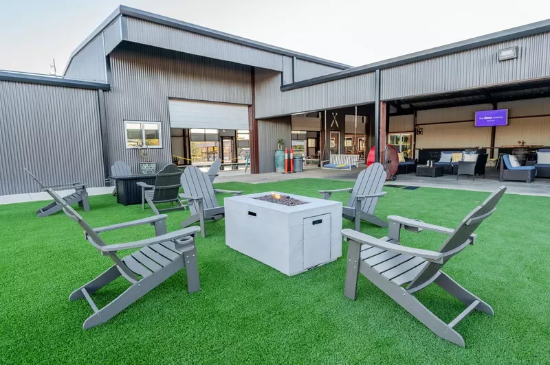 activity center and fire pit at twin lakes resort in texas