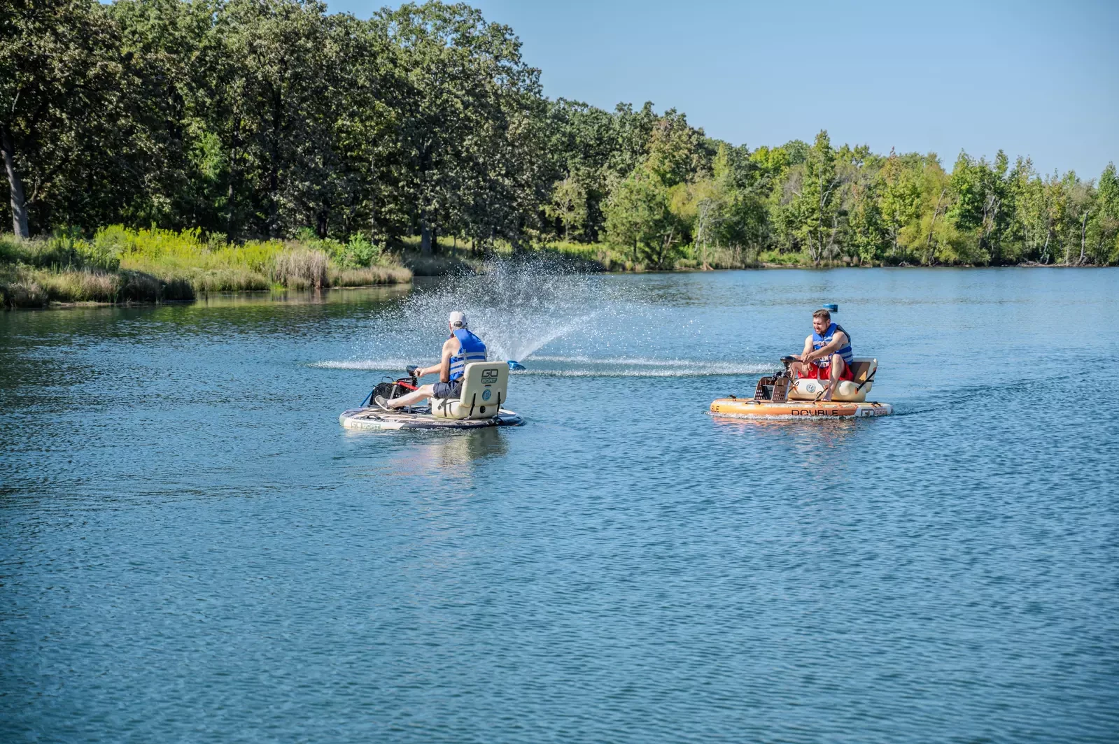 two people boating on the lake